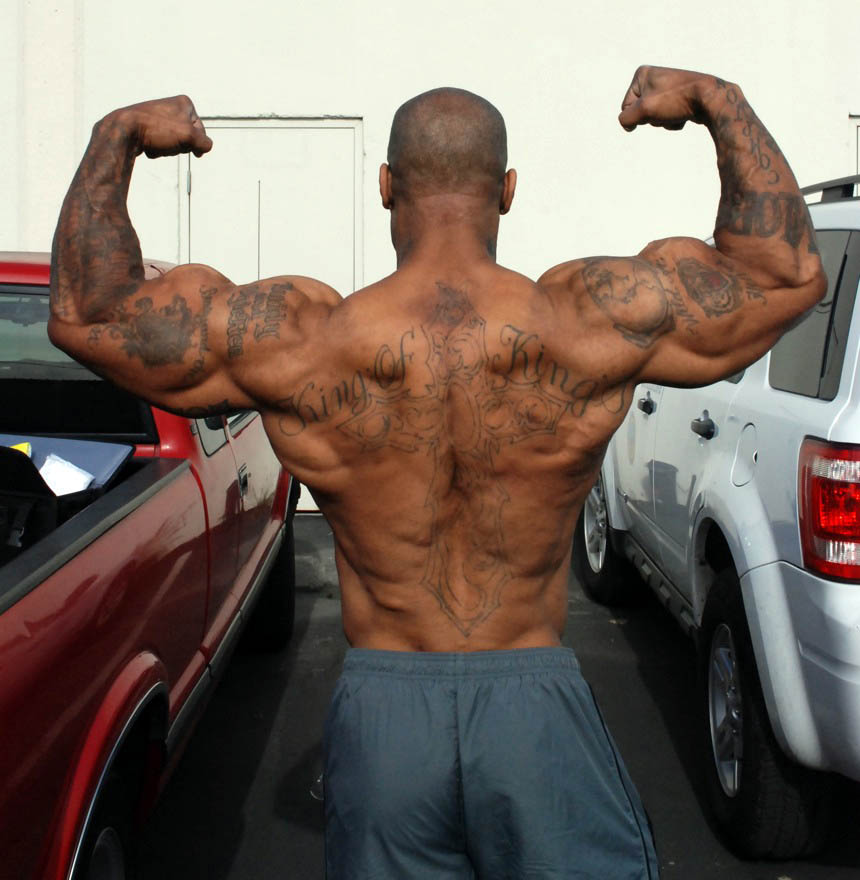 Bodybuilder C.T. Fletcher Rear Double Biceps